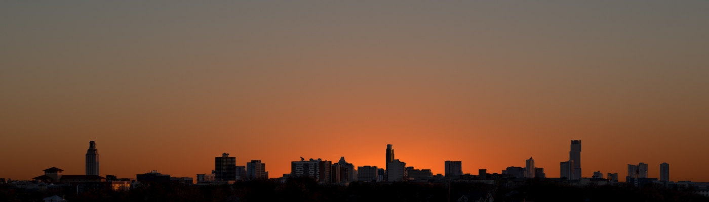 Silhouette of downtown Austin Texas against sunset